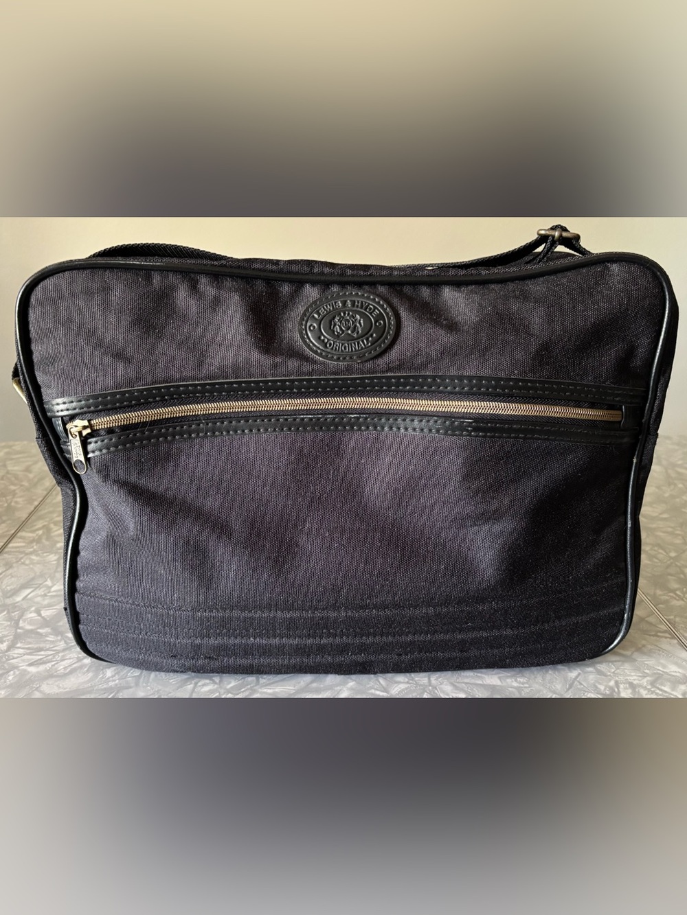 The Original Lewis & Hyde Dark Gray Carry on Bag w/ shoulder strap.